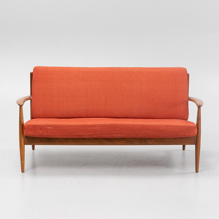 A sofa and easy chair by Grete Jalk from France & Daverkosen.