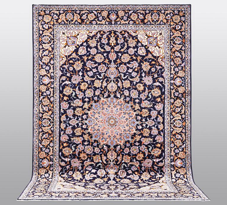 A carpet, Kashan, ca 411 x 284 cm.