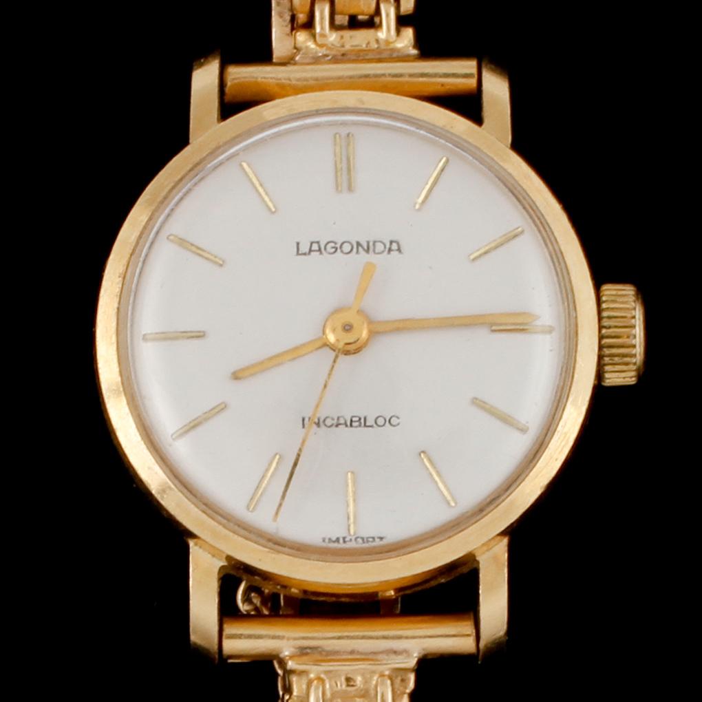 DAMARMBANDSUR, Lagonda Incabloc, 18k guld. 1900-talets mitt. Vikt 18 g.