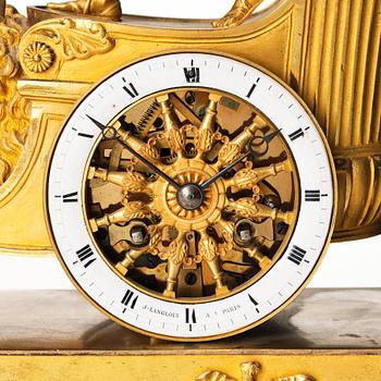 A French Empire early 19th century gilt bronze mantel clock, marked J Langlois à Paris.