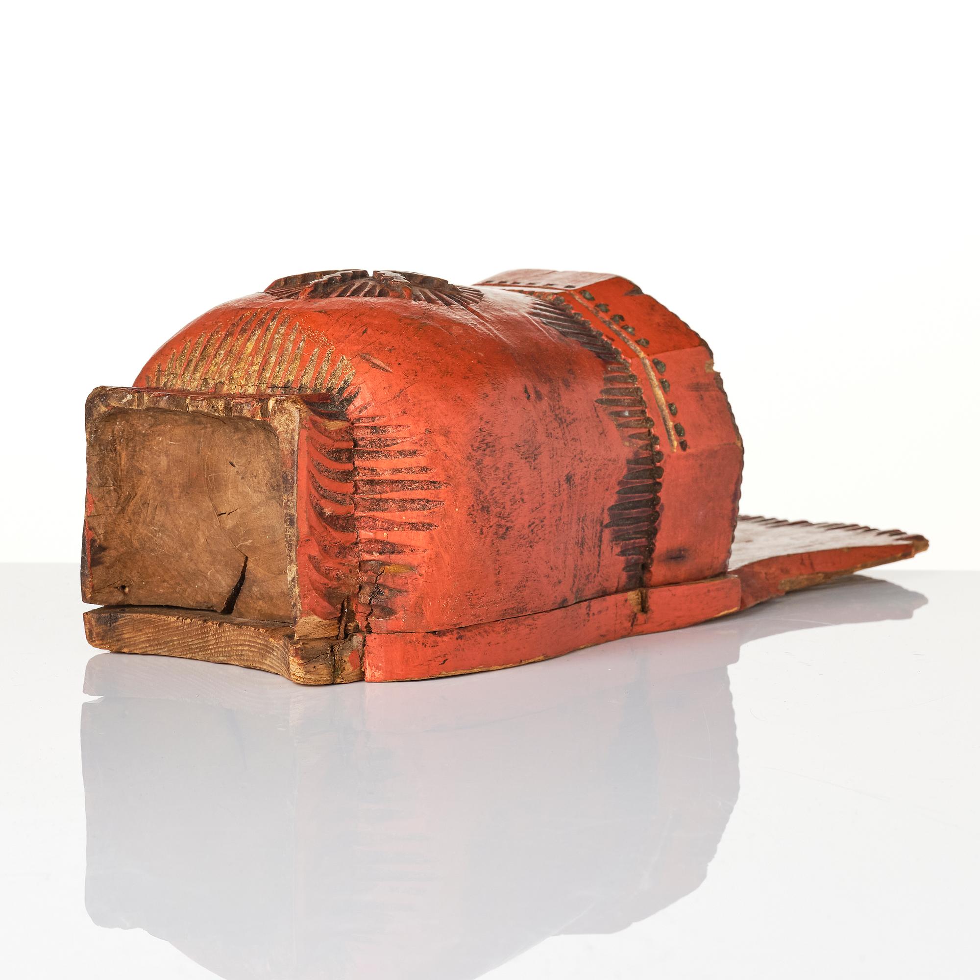 A Swedish folk art carved and painted spoon holder, 18th century.