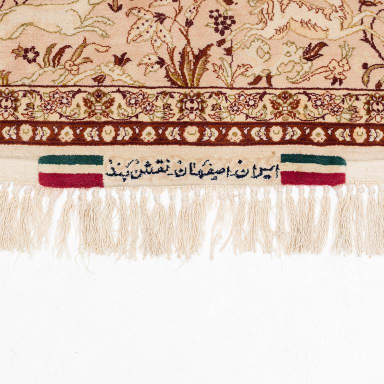 A signed part silk Esfahan rug, ca 233 x 147 cm (as well as 3 cm flat weave on each side).