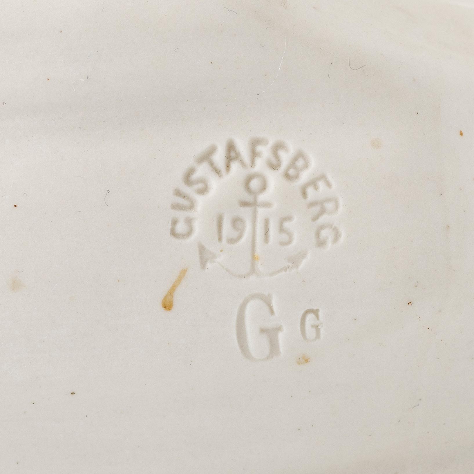 Figurin, "Pojke med groda", Gustafsberg, 1915.