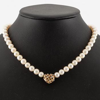 Ole Lynggard lås i form av ett hjärta 18K guld med runda briljantslipade diamanter.