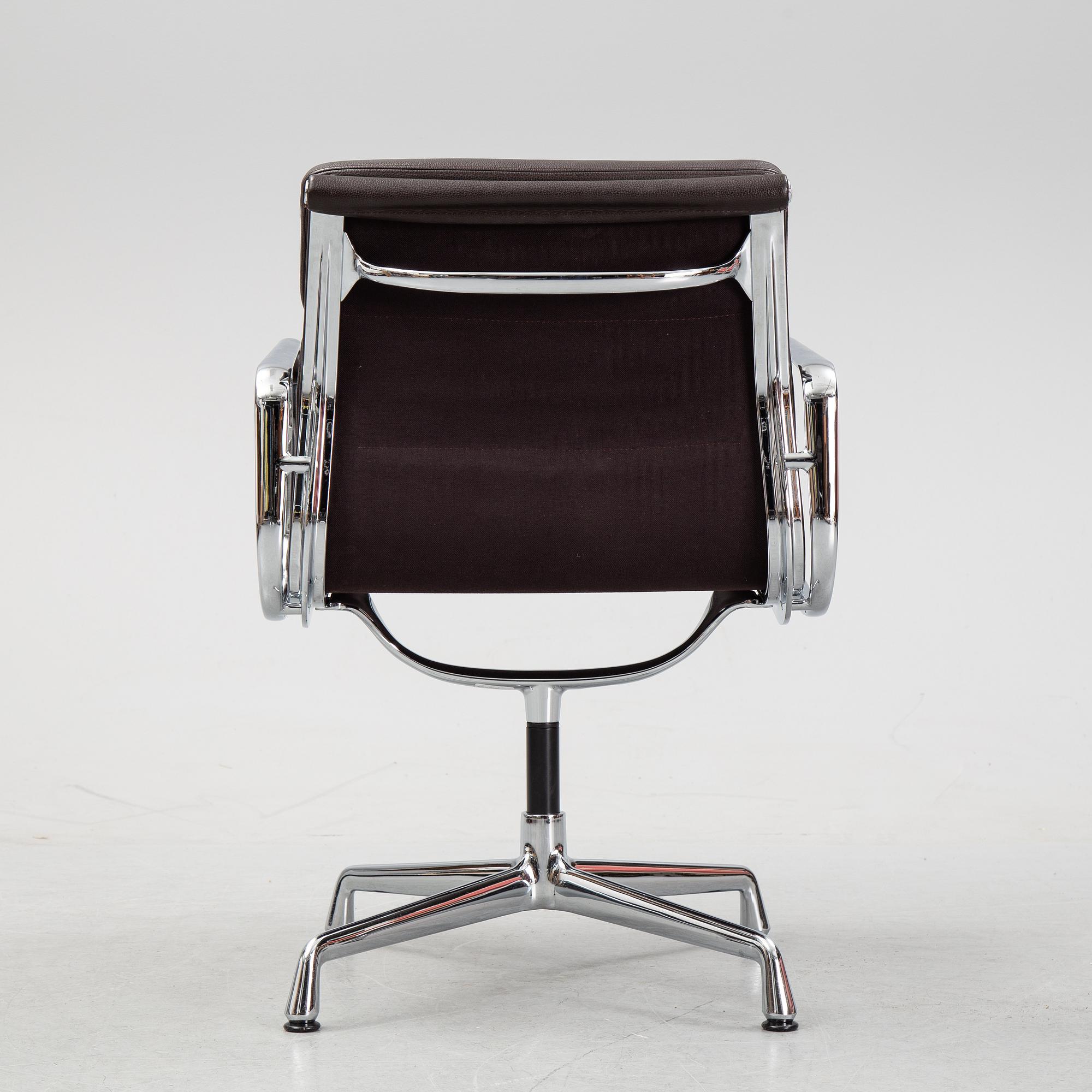 An EA 208 Soft Pad swivel chair by Charles and Ray Eames for Vitra, dated 2010.