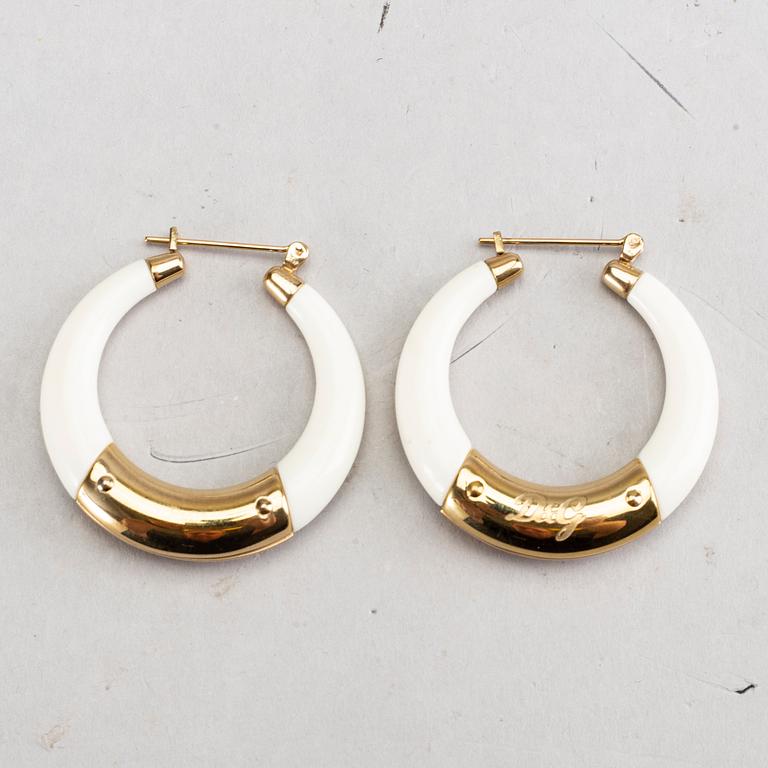 A pair of Dolce & Gabbana earrings.