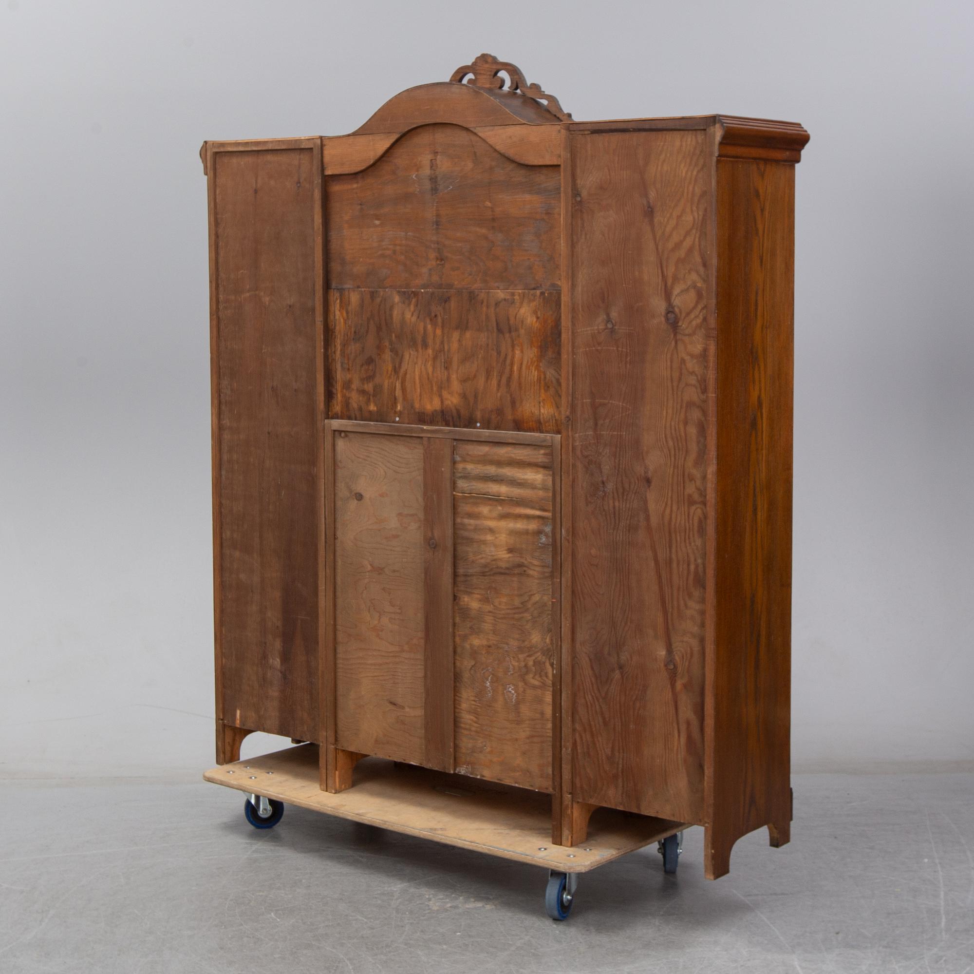 A second half of the 20th Century oak cupboard.
