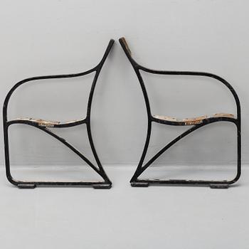 A pair of cast iron garden sofa ends by Folke Bensoq, Näfveqvarns Bruk, early 20th century.