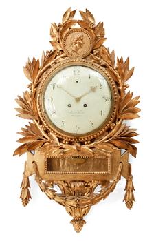 784. A Gustavian wall clock by J. Koch.