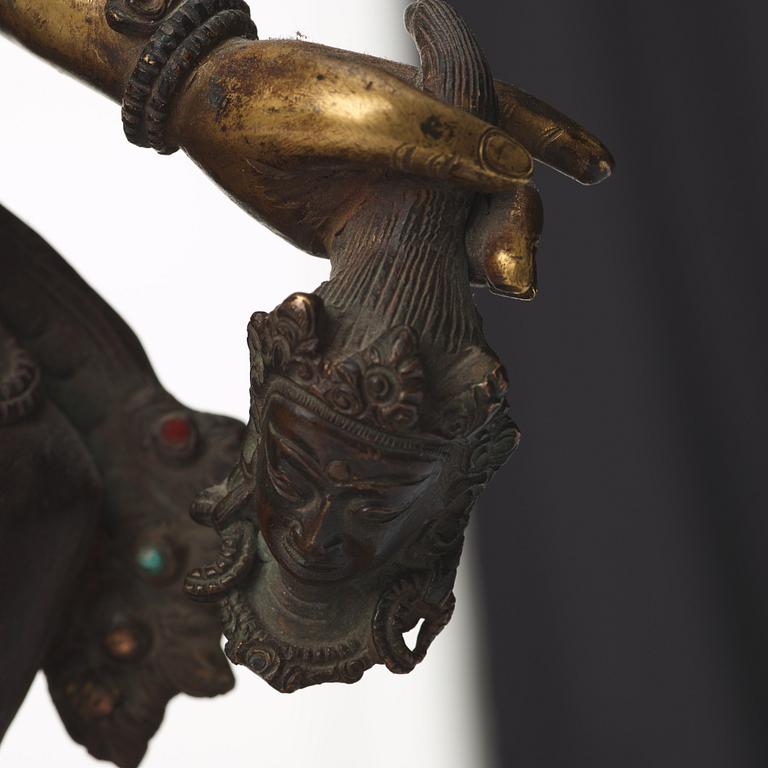 A large Tibetan eight armed deity, probably 20th Century.