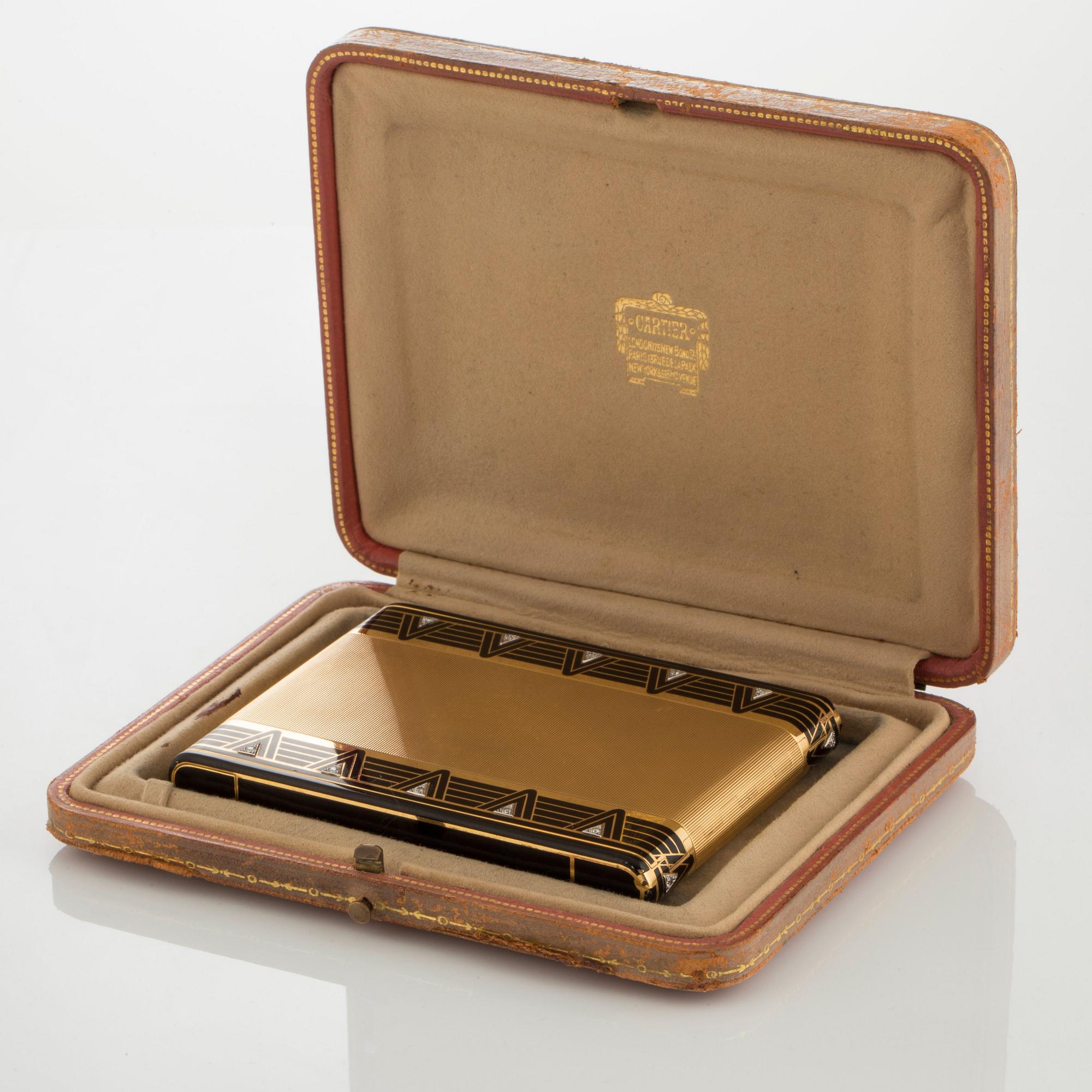 Cartier Art Deco cigarettetui 18K guld med svart emalj och åttkantslipade diamanter.