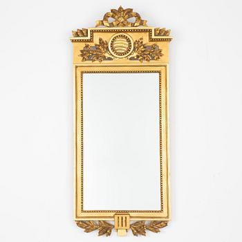 A Gustavian style mirror, mid 20th century.
