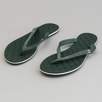 CHANEL, a pair of plastic flip-flop sandals, size 37.