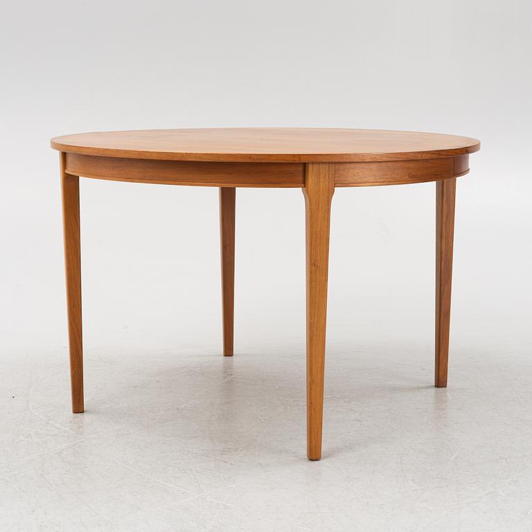 A walnut dining table from Linden, 1960s.