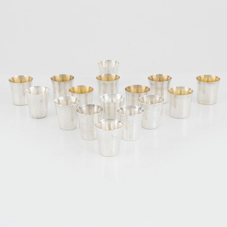 A set of 16 silver cups, including GAB, Stockholm 1964.