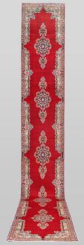 A runner carpet, Kirman, c. 633 x 88 cm.