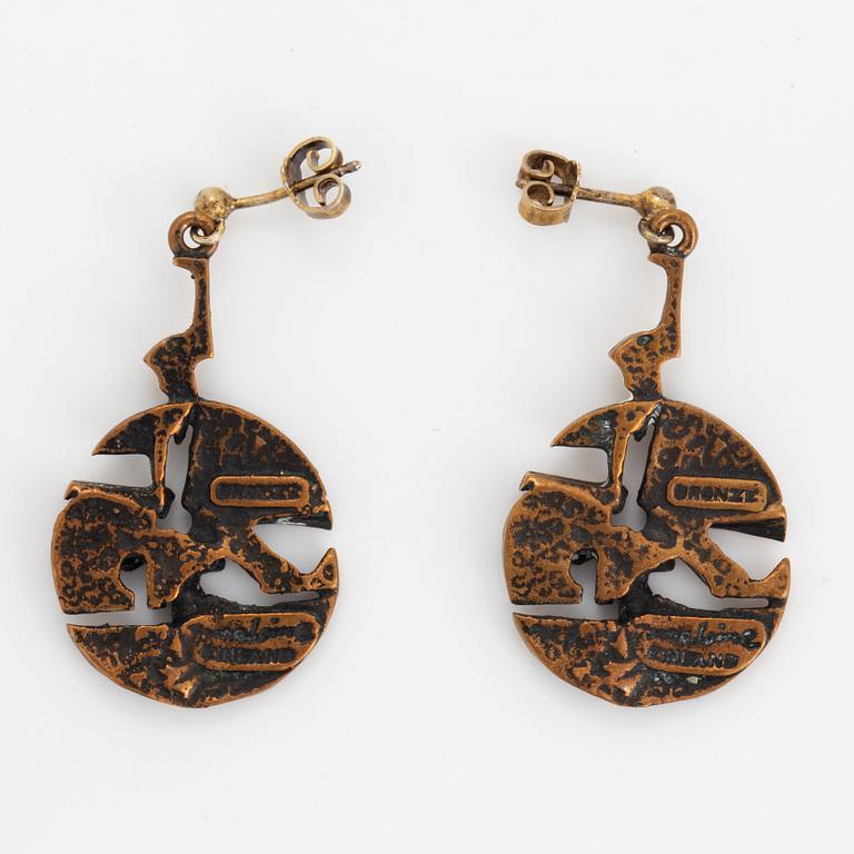 A pair of Jorma Laine earrings in bronze.