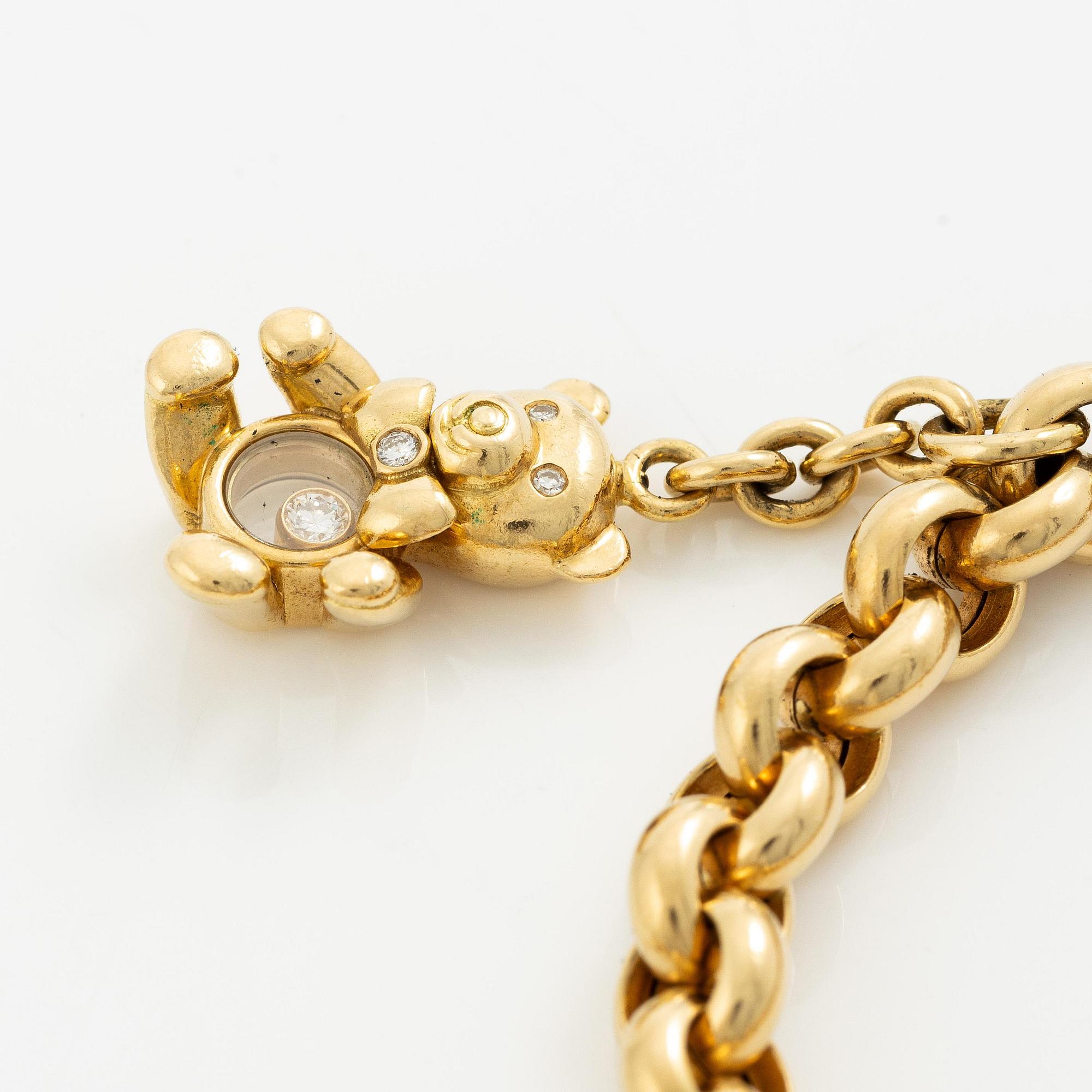 Chopard armband med berlocker 18K guld med runda briljantslipade diamanter.