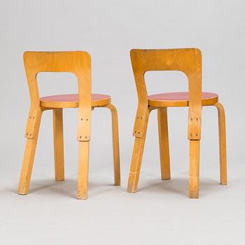 Alvar Aalto, a mid 20th century 'DL85' folding table, seven chairs for Artek.