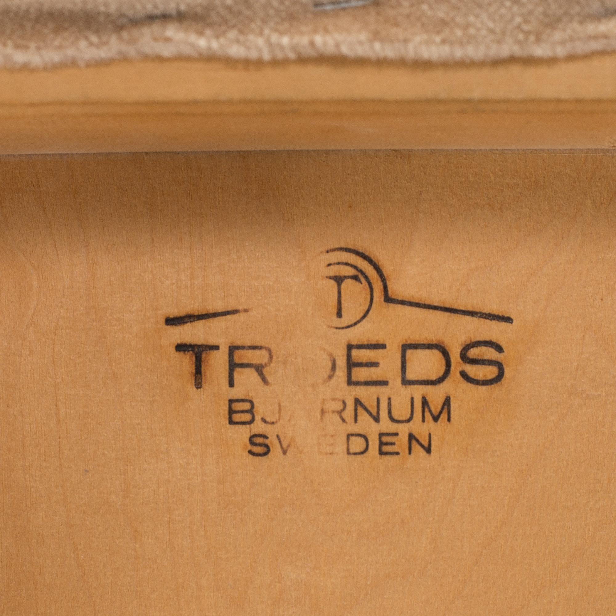 A dining table and four chairs by Nils Jonsson, Troeds Bjärnum.