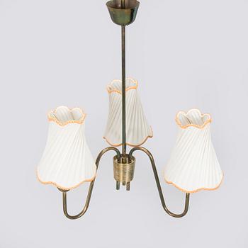 A mid-20th century ceiling light by Valinte.