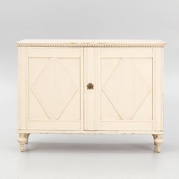 A late Gustavian cupboard, circa 1800.