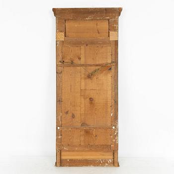 A late Gustavian giltwood and inset gouache mirror, circa 1800.