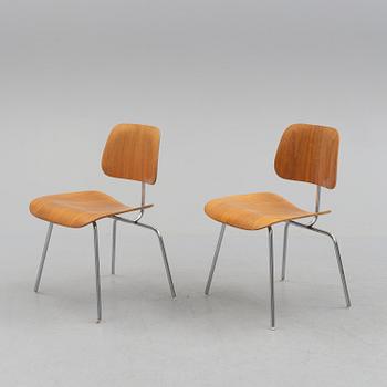 CHARLES & RAY EAMES, a pair of DCM chairs from Herman  Miller.