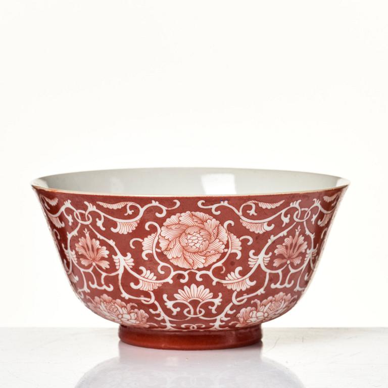 A coral red reverse decorated floral bowl, seal mark of Daoguang, Republic, 20th Century.