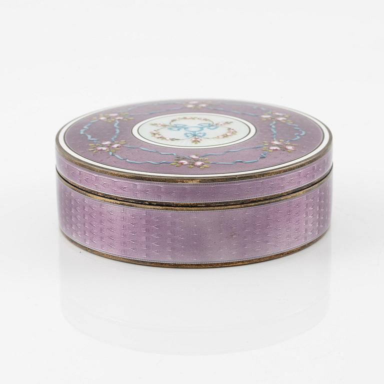 A German 19th century silver gilt and enamel guilloche box with lid.