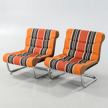 A pair of 1970s lazy-chairs by Viskadalens Möbelindustri.