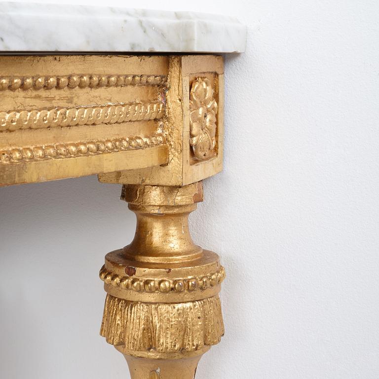 A pair of Gustavian late 18th century corner console tables.