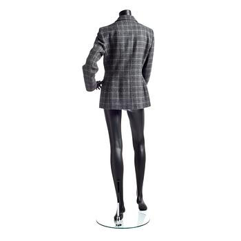 MOSCHINO CHEAP AND CHIC, a grey chequered wool jacket.