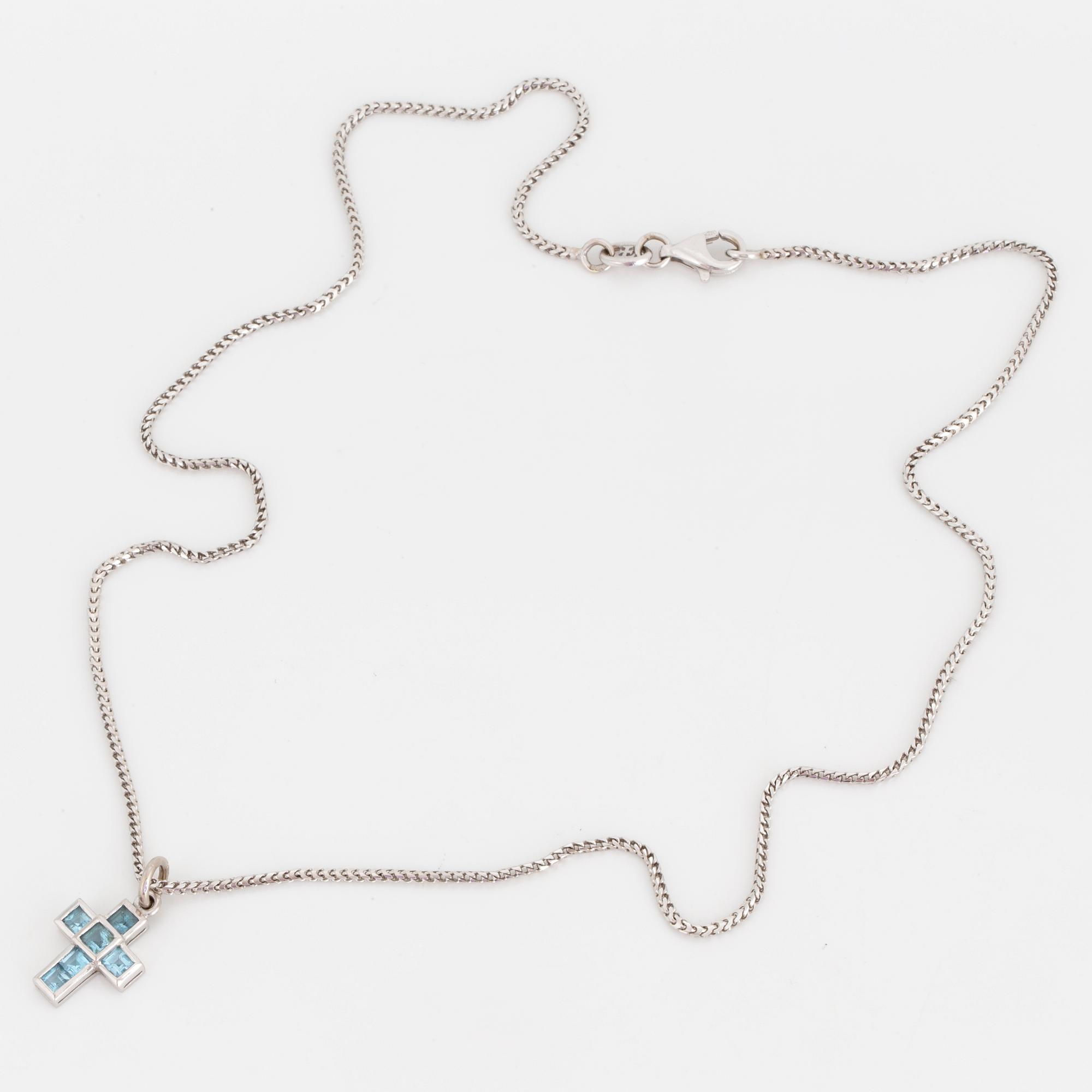 A NECKLACE, Theo Fennel, 18K white gold set with blue topazes.