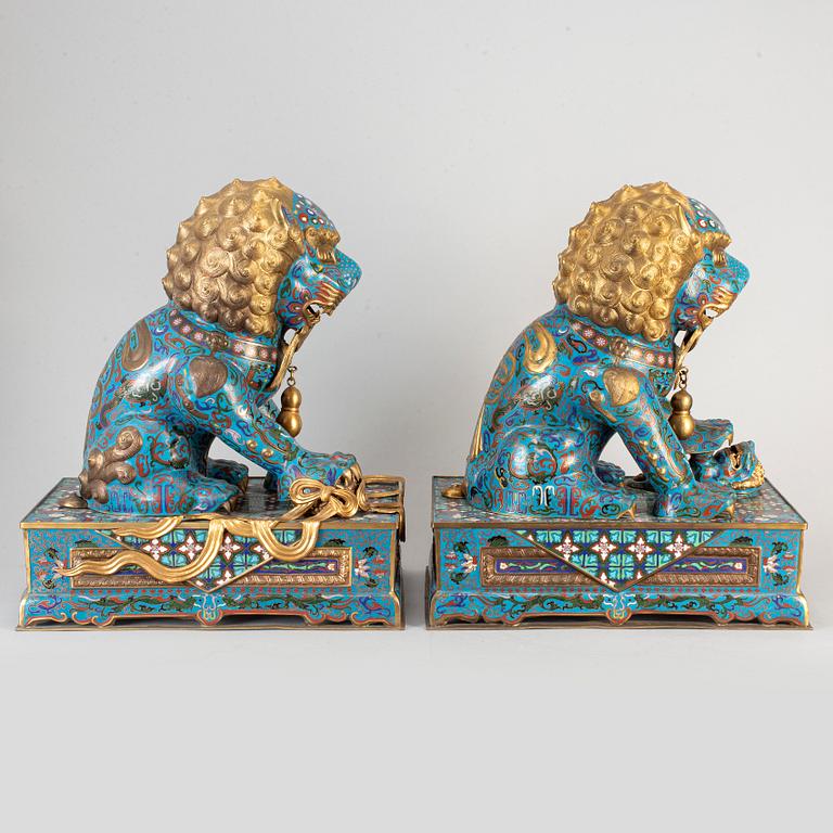 A pair of cloisonne buddhist lions, China, modern manufactory.