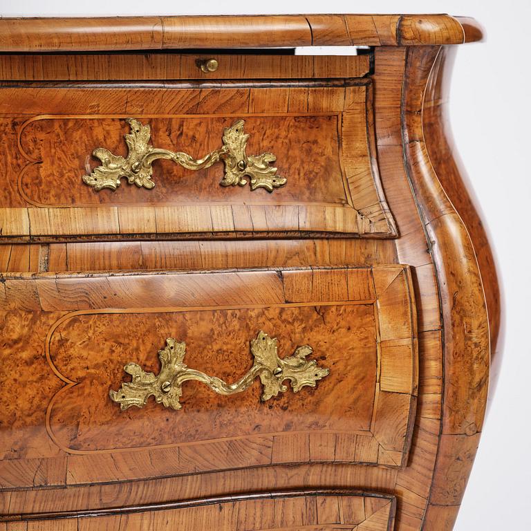 A burr alder parquetry rococo commode, Mälardalen, Sweden, later part 18th century.
