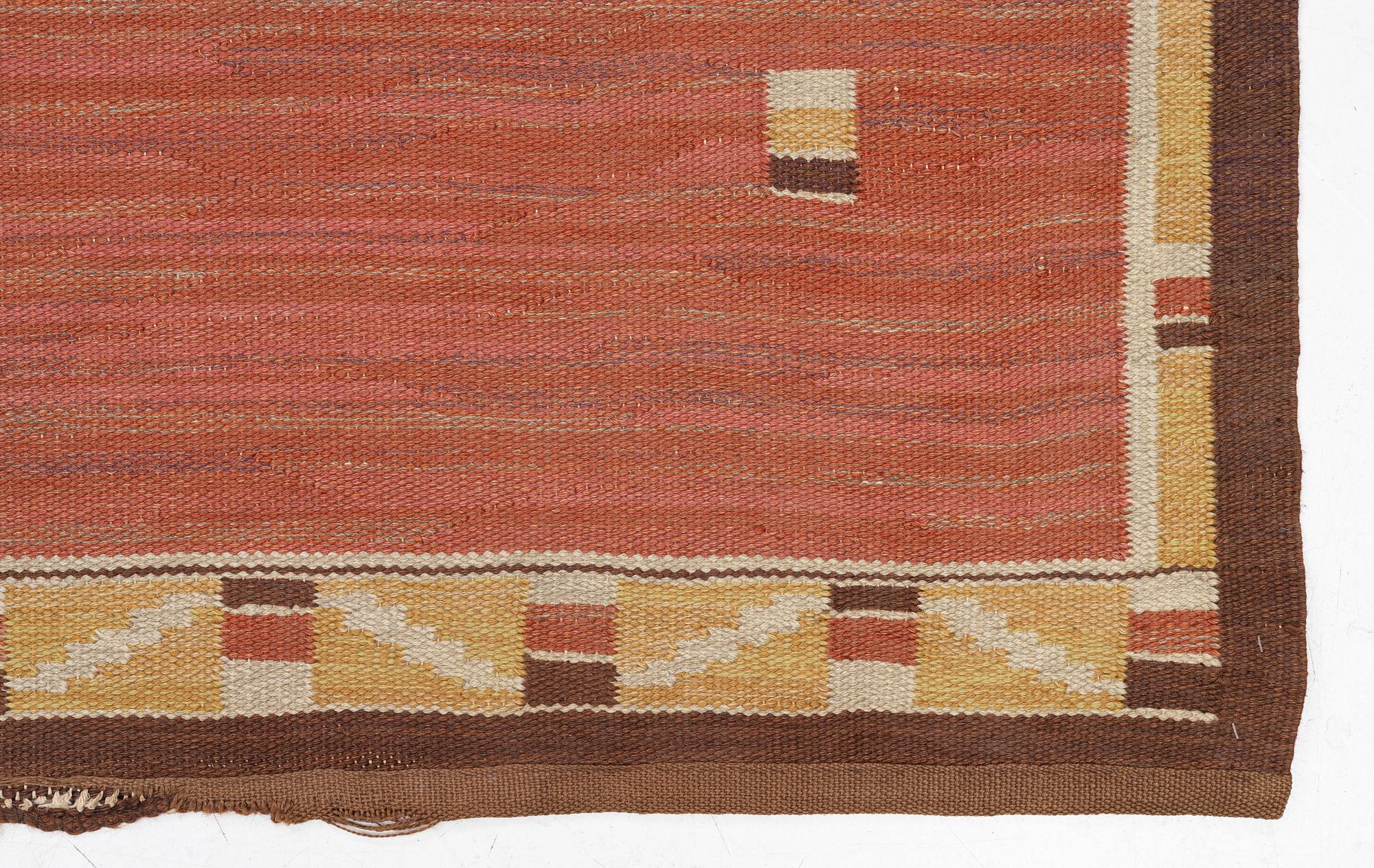 A flat weave carpet, c. 360 x 265 cm.