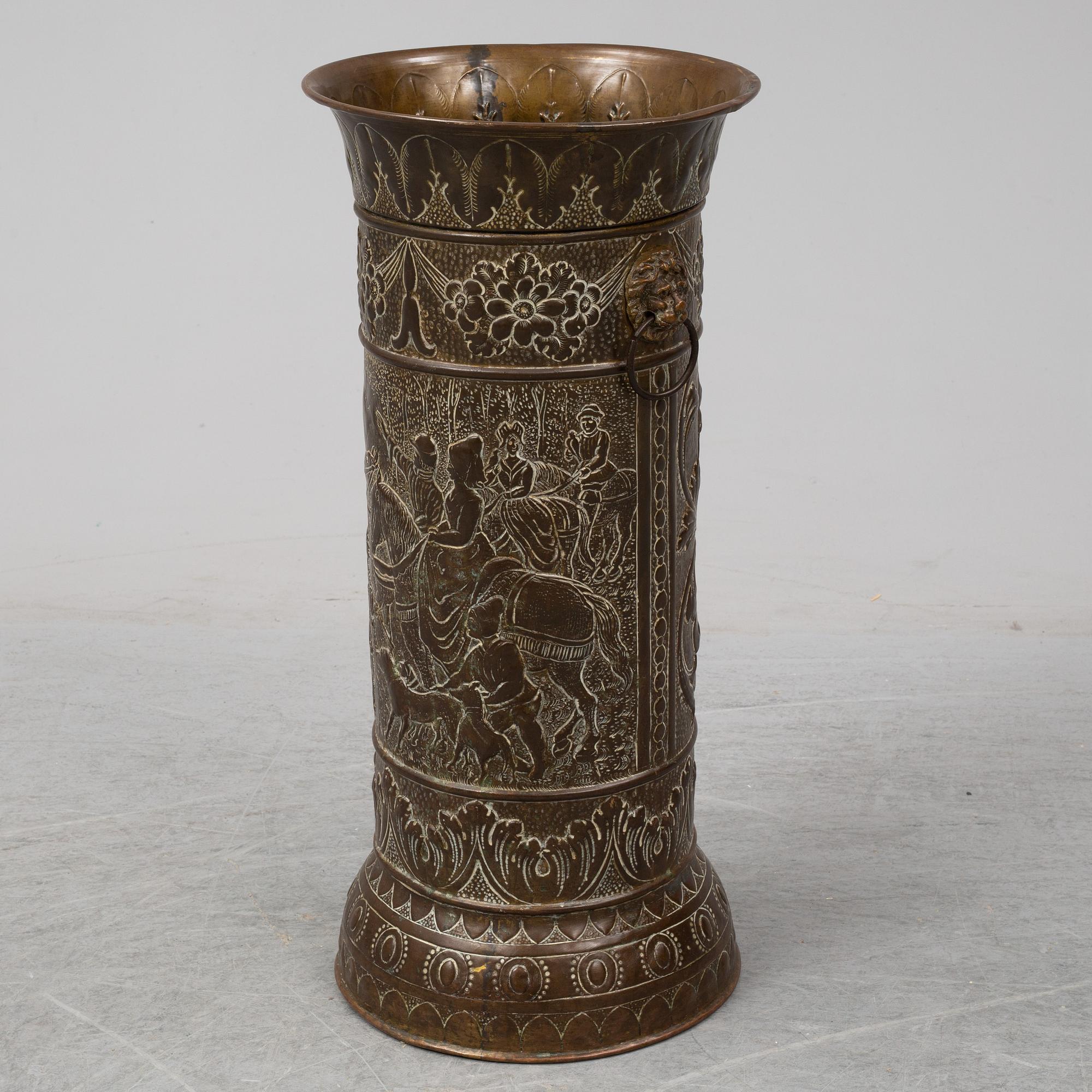 A 19th century brass umbrella stand.