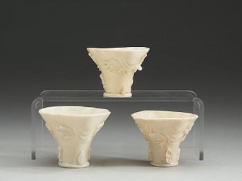 A set of three blanc de chine libation cups, Qing dynasty.