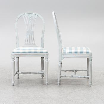 A Gustavian style seven-piece dining suite, mid-20th Century.