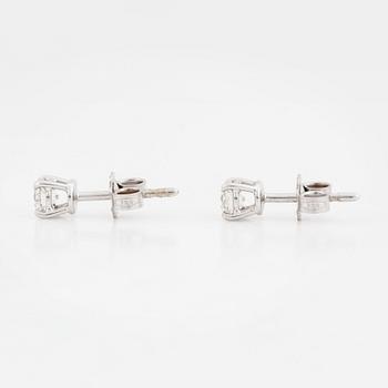 Brilliant-cut diamond earrings.