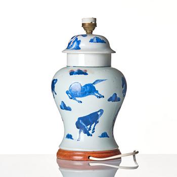 An iron red and blue 'horse' vase, Qing dynasty, 17th century.