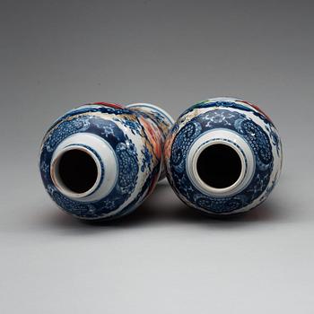 A pair of famille rose vases, Qing dynasty, Qianlong (1736-95).