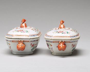 A pair of famille rose 'double peacock' butter tureens with covers and stands, Qing dynasty, Qianlong (1736-95).