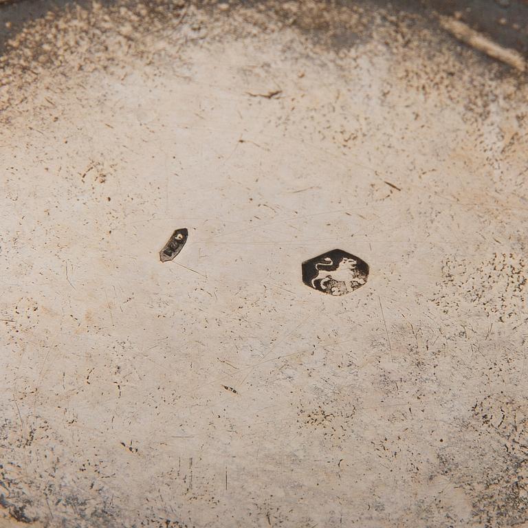 Four silver objects from the 20th Century.