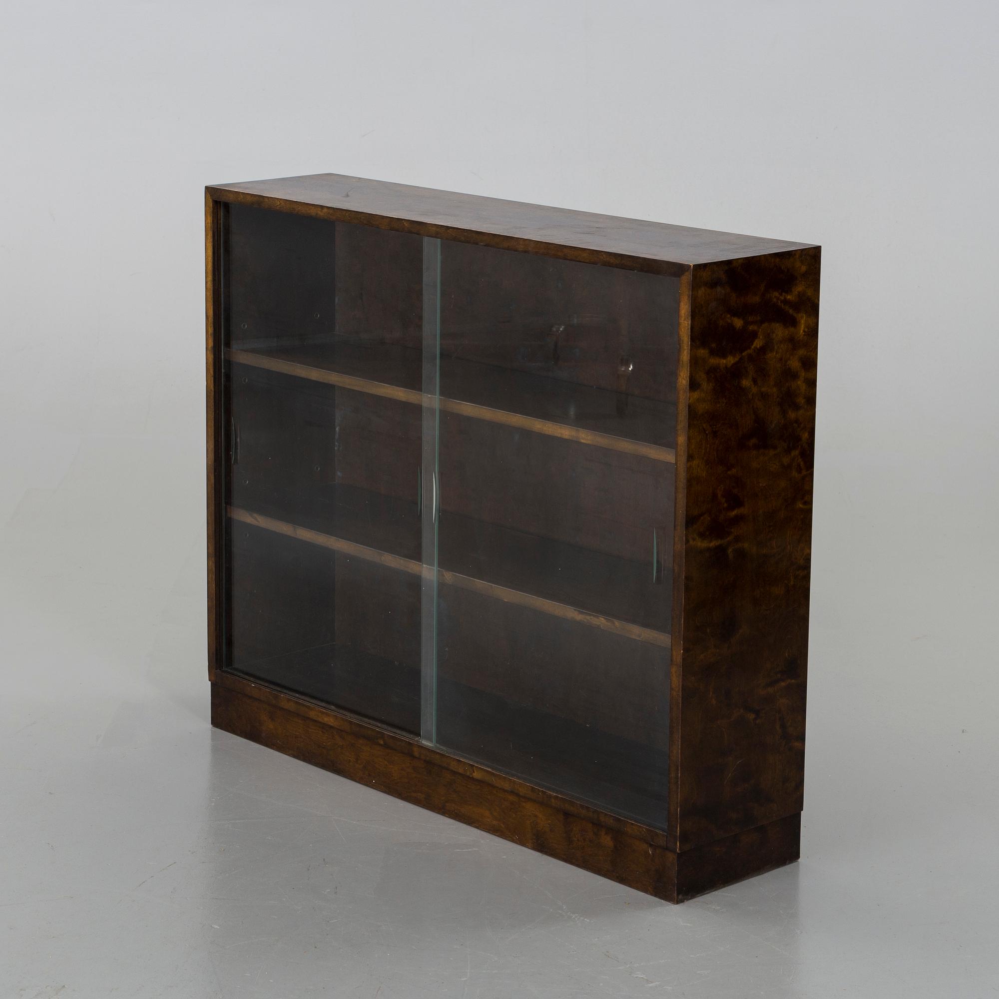 A 1930'S BOOK SHELF.