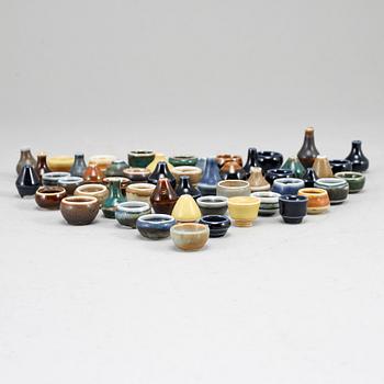 RÖRSTRAND, a set of 52 stoneware mini miniature vases and bowls.