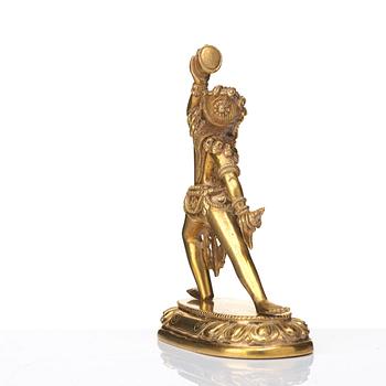 A gilt bronze figure of Dakini, Tibeto-Chinese, 19th Century.