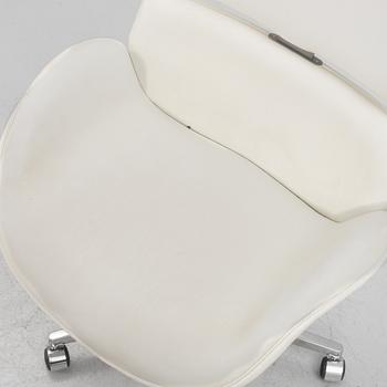 A contemporary swivel chair, Roche Bobois.