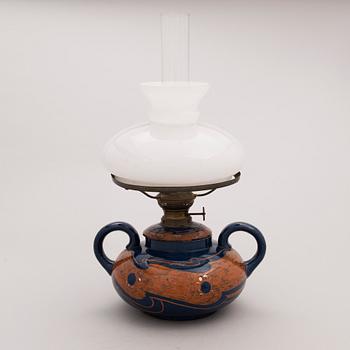 Alfred William Finch, A Finnish oil lamp around 1900 by Iris.